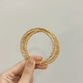 Macro shot of gold plated multi-layer beaded bracelet showing faceted metal bead texture - Multi-layer Beaded Spiral Style / Gold (Real Gold Plated)