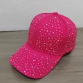 Close-up detail of rose red baseball cap with colorful rhinestones on a flat layout - Rose Red