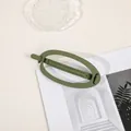 Macro view of matte matcha green hair claw with frosted finish and anti-slip teeth - Oval - Army Green