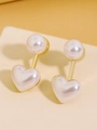 Elegant gold earrings with white heart-shaped and round pearls on a cream surface - Pearl Gold (G-116)