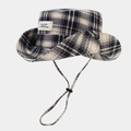 Detail of plaid sun hat with adjustable drawstring and side snaps for versatility - M (56-58cm) / Black Plaid