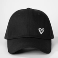 Classic black cotton baseball cap with white hand-drawn heart pattern and curved brim - One Size / Black