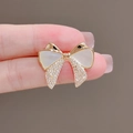 Golden bow brooch with mother-of-pearl inlay and sparkling zircon crystals for women - 346# Bowknot