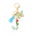 Letter J crystal keychain with dried red flowers, blue tassel and butterfly charm - Letter J