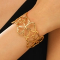 Polished gold wide cuff bracelet with hollow floral leaf patterns for women - Four-Leaf Clover Hollow (DZ-831)