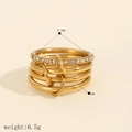 Detail view of gold multi-layered ring showing 17.5mm diameter and pave-set rhinestones - Size 7 / Stackable Wrap Multi-ring (TR4438-G-7) / Gold