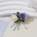 Detail of handmade ribbon rose brooch with purple and cream flowers and silver bead tassels - Purple