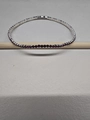 Single row stretch bracelet with purple crystals and a polished silver base - Silver-Purple