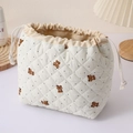 Cute quilted cosmetic bag featuring adorable bear pattern, portable travel drawstring pouch. - Dots Little Bear