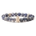 Detail of blue spotted sodalite beads and white accent stone on elastic elephant bracelet - Sodalite