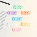 Detailed view of resin BABY letter charms in seven assorted pastel colors for DIY crafts - Baby (Small)
