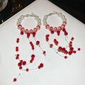 Detail of elegant red and white beaded tassel earrings with silver hooks and pearls - S925 Silver Needle Beaded Earrings / White-Red