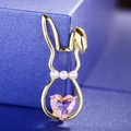 Golden rabbit brooch with a pink heart-shaped gemstone and white pearl accents - Gold Hollow Rabbit (40111C)