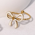 Gold plated stainless steel open ring with white enamel bow and twisted rope band - Light Yellow