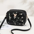 Black cross body camera bag with pink floral embroidery and 3D butterfly decoration - Black