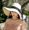 Creamy white straw beach hat with black ribbon bow for elegant sun protection - One Size / Milk White with Black Trim
