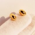 Orecchini a lobo minimalisti a forma di fagiolo in finitura oro lucido su superficie testurizzata - Oro