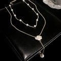 Elegant double-layered gold necklace with pearl accents and white rose pendant - Gold Double-layer Rose Pearl Style