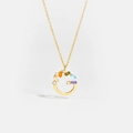Close-up of letter G pendant with multi-color baguette gemstones and gold chain - 925 Silver / Letter G