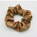 Lustrous brown satin hair scrunchie with soft silk texture on white background - Brown