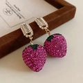 Macro shot of sparkling pink rhinestone strawberry earrings with golden hooks - Full Rhinestone Strawberry Shape Style (26# Silver Pin)