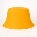 Detailed view of yellow bucket hat with reinforced stitching on the brim and cotton texture - Yellow