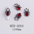 Macro view of Gothic spider nail charm with red gemstone and silver metal base - AE64-Red Teardrop Spider