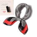 Elegant red and black houndstooth pattern small silk scarf tied in a stylish knot - Black Red Border