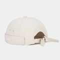 Detailed view of beige canvas miki hat with whale embroidery and metal adjustment buckle - Beige