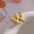 Minimalist gold balloon style letter W pendant necklace with a fine chain for women - Letter W