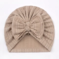 Detail of soft ribbed knit baby turban hat with oversized bow in beige color - One Size / Light Coffee