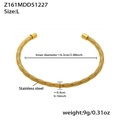 Detail showing 6.3cm inner diameter and 0.4cm thickness of golden stainless steel bangle - L / Spiral Spring Coil Style (Z161) / Gold