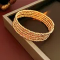 Elegante bracciale multistrato placcato oro con texture argento per donna di classe - Oro (Placcato Oro Vero)