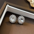 Elegant silver oval stud earrings with clear crystal center and halo on dark box - Iced Out Oval (37# Silver Pin-Silver Rhinestone Oval)