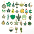 Assorted green enamel metal pendants for DIY jewelry making with gold plated finish - Green New 30 Style (HK553)