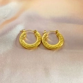 Golden medium hoop earrings with textured honeycomb pattern on silky fabric background - Honeycomb Scale Texture Hoop Style (EH300)
