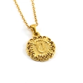 Golden titanium steel necklace featuring a hollow sun-patterned round pendant for women - Letter U