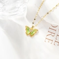 Elegant gold butterfly pendant necklace with green crystal inlay and fine chain - Light Green