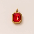Detail of 18k gold-plated pendant with a large rectangular red birthstone setting - January Birthstone Pendant (Garnet)