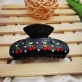 Minimalist black acrylic hair claw clip featuring red cherry rhinestone embellishments - Black