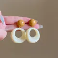 Detail of vintage round wicker earrings with brown beads and ivory resin hoops - 12# 925 Sterling Silver Earring Post - White - Two-tone Geometric Dangle