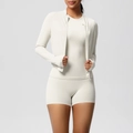 Three-piece cream yoga set featuring slim fit zip-up jacket, vest, and high waist shorts - Light Ivory