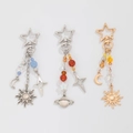 Star-shaped metal keychain with sun, moon, and bead charms in gold and silver finishes - Gold Silver Celestial Style (5390)
