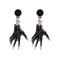 Gothic Halloween earrings featuring black hand designs with purple nails and bones on white backdrop - Black Purple Skeleton Hand