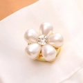 Detail of flower-shaped shirt clip with five white faux pearls and a gold-tone base - Five-Petal Flower Style (25081194)