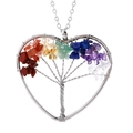 Detailed macro shot of heart-shaped tree of life pendant with colorful natural stones - Multicolor Heart