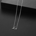Leo constellation silver stainless steel pendant necklace on a minimalist dark background - Leo Steel