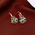 Detail of 18K gold-plated carousel horse earrings with teal enamel and heart accents - Ear Buckle-Gold-Blue-Real Gold Plated