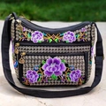 Ethnic black shoulder bag with colorful purple peony floral embroidery and gold zip charms - Purple Apple Blossom