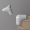 Protezione angolare in silicone grigio per neonati con mostro su mobili in legno - Angolo Dinosauro Corto Grigio